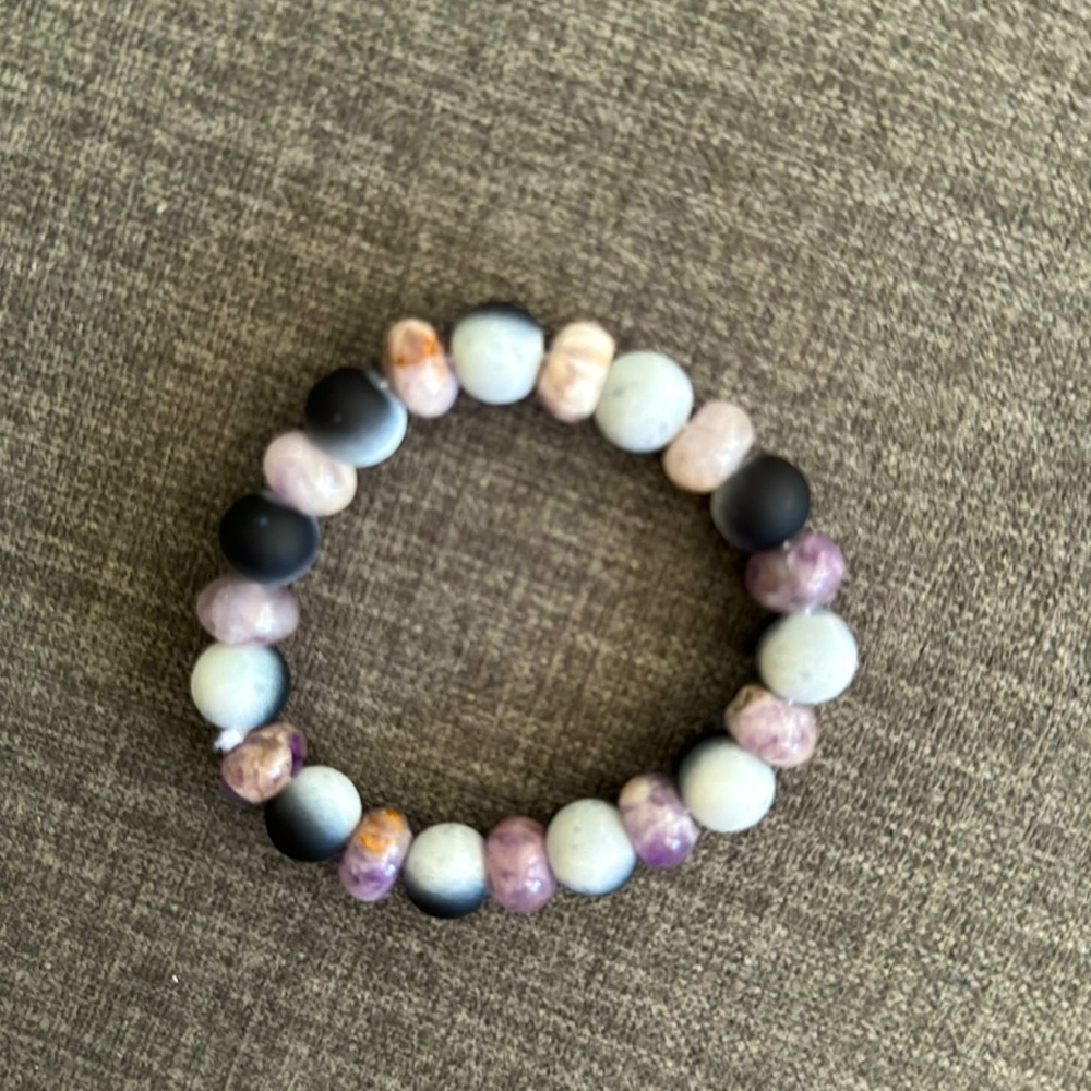 Handmade bracelet with black/purple glass beads